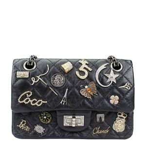 Chanel Black leather charm purse FAUX